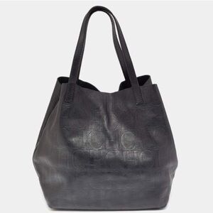 Carolina Herrera Black Monogram Leather Matryoshka Tote Bag.